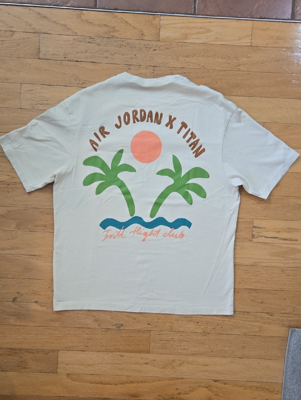Nike Air Jordan x Titan Cream Tee with Green Jumpman and Coral Script Men's